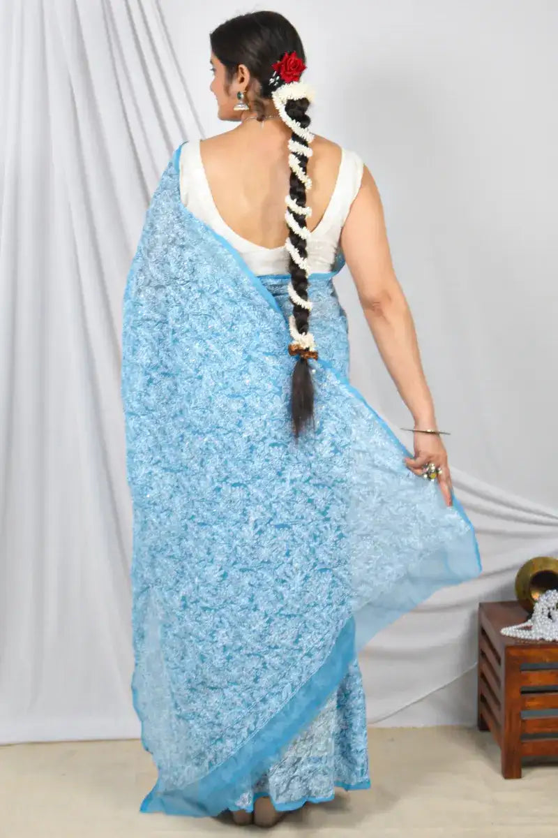 Aqua Blue Color Georgette Allover Tepchi Lucknowi Chikankari Saree With Mukaish Work Embroidery and Blouse – Perfect for Weddings & Festive Wear.