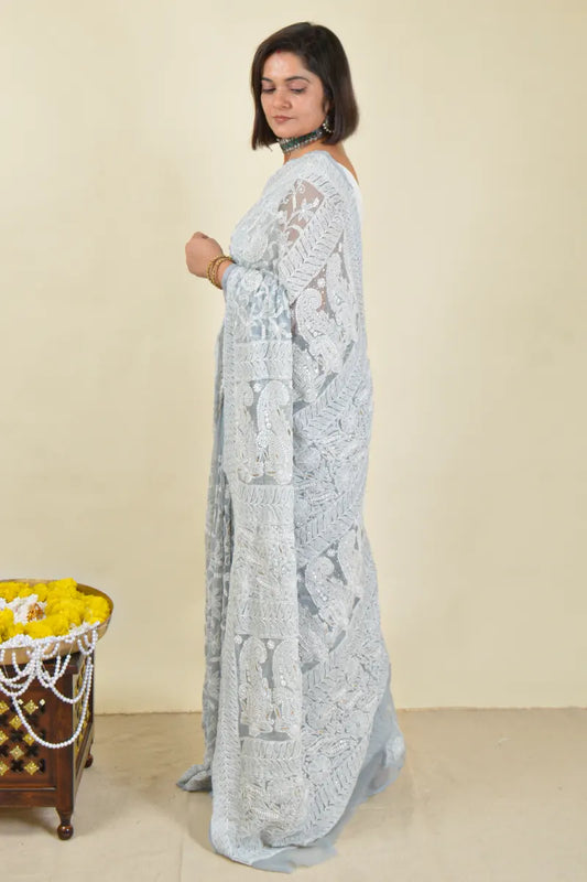 Handcrafted Gray Allover saree with intricate Lucknowi Chikankari embroidery and a matching blouse, ideal for festive and wedding occasions.