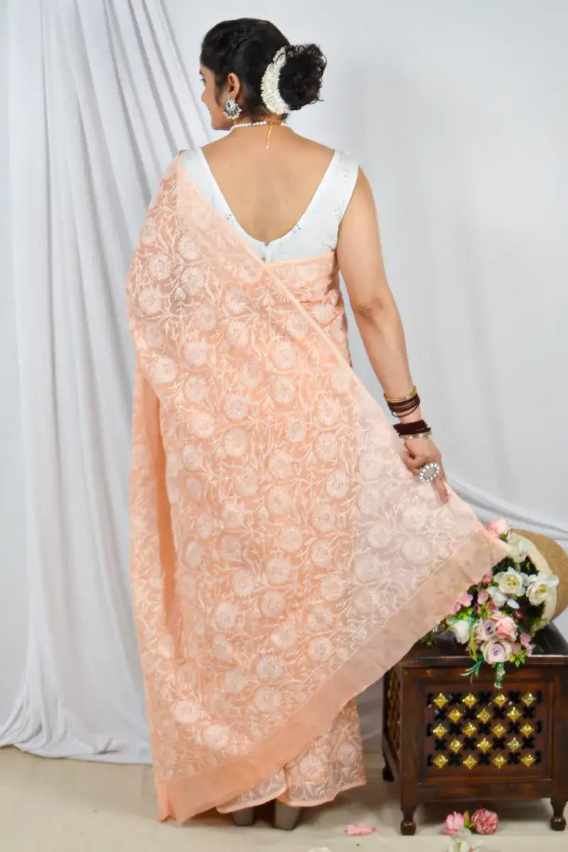 Handcrafted Orange Allover Kota Cotton saree with intricate Lucknowi Chikankari embroidery and a matching blouse, ideal for festive and wedding .