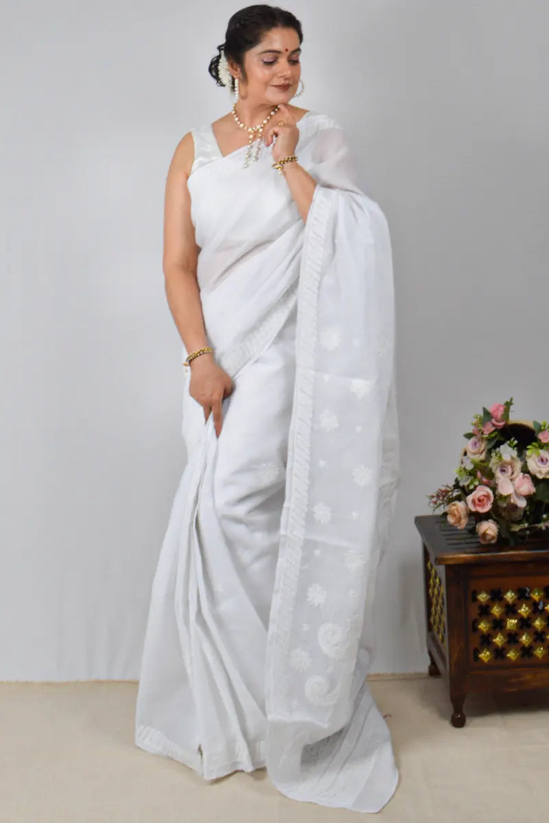 White cotton saree with hand-embroidered Lucknowi Chikankari and matching blouse – handcrafted summer-friendly ethnic wear by MeMaana.