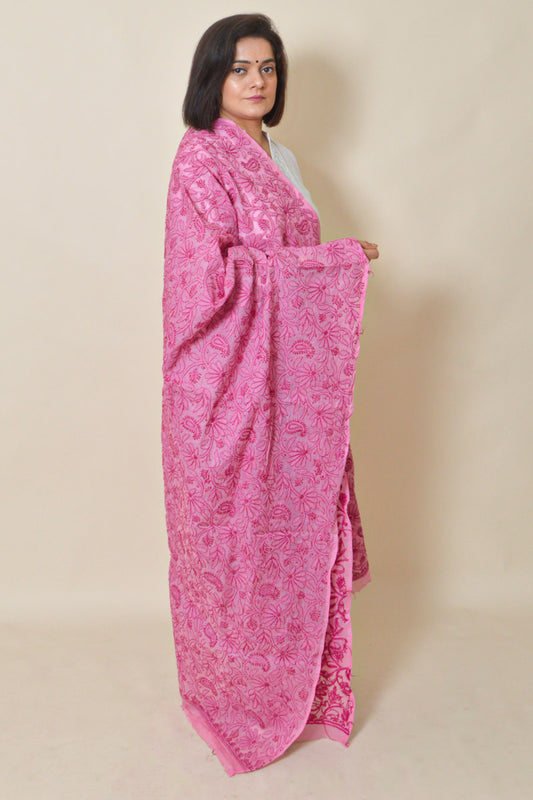 Woman draped in Fabnuma Handcrafted Pink Cotton Allover Chikankari Dupatta with intricate floral embroidery.