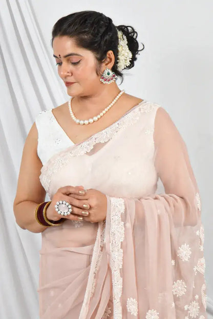 Handcrafted Beige Georgette Saree with Pearl & Sequin Work Designer Lucknowi Chikankari Embroidery and a matching Blouse, ideal for Festive and  occasions.