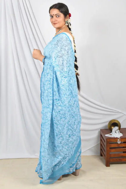 Aqua Blue Color Georgette Allover Tepchi Lucknowi Chikankari Saree With Mukaish Work Embroidery and Blouse – Perfect for Weddings & Festive Wear.