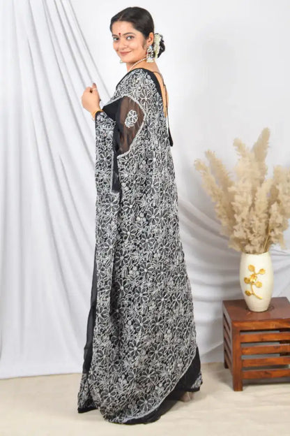 Black Georgette saree with Lucknowi Chikankari embroidery and unstitched blouse – handcrafted festive wear by Fabnuma