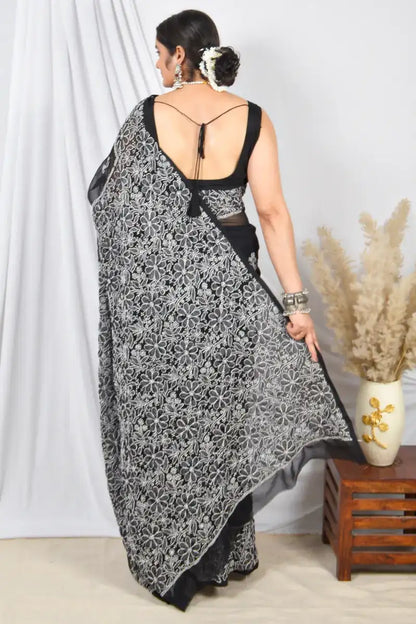 Black Georgette saree with Lucknowi Chikankari embroidery and unstitched blouse – handcrafted festive wear by Fabnuma
