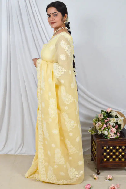Handcrafted Yellow cotton Saree with intricate Lucknowi Chikankari embroidery and a matching Blouse, ideal for Festive and  occasions.