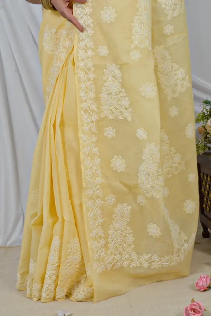 Handcrafted Yellow cotton Saree with intricate Lucknowi Chikankari embroidery and a matching Blouse, ideal for Festive and  occasions.