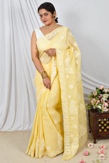 Handcrafted Yellow cotton Saree with intricate Lucknowi Chikankari embroidery and a matching Blouse, ideal for Festive and  occasions.