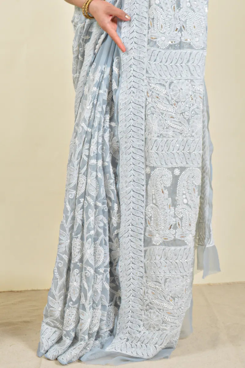 Handcrafted Gray Allover saree with intricate Lucknowi Chikankari embroidery and a matching blouse, ideal for festive and wedding occasions.