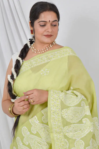 Handcrafted Green Skirt Palla Cotton Saree with intricate Lucknowi Chikankari embroidery and a matching Blouse, ideal for Festive and  occasions.