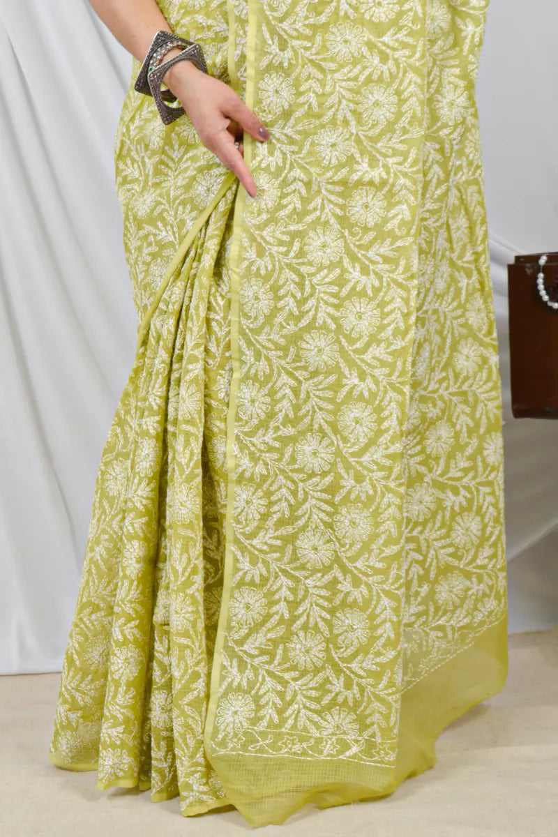 Handcrafted Green Kota Cotton Designer saree with intricate Lucknowi Chikankari Embroidery and a matching blouse, ideal for festive and wedding occasions.