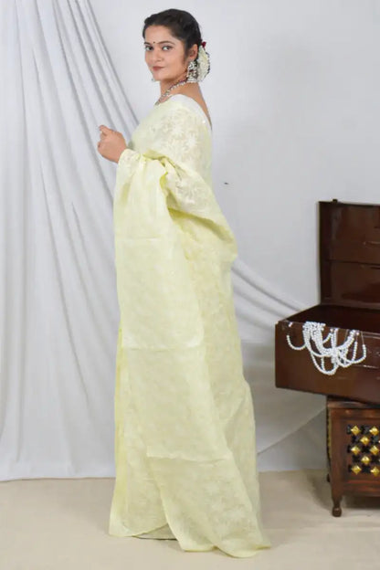 Handcrafted Lemon Cotton saree with intricate Lucknowi Chikankari embroidery and a matching blouse, ideal for festive and wedding 
