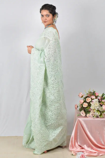 Green Cotton saree with Lucknowi Chikankari embroidery and unstitched blouse – handcrafted festive wear by Fabnuma