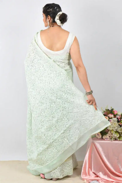 Green Cotton saree with Lucknowi Chikankari embroidery and unstitched blouse – handcrafted festive wear by Fabnuma