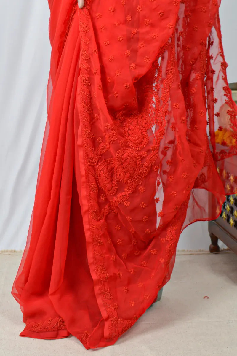 Red georgette saree with hand-embroidered Lucknowi Chikankari and unstitched blouse – festive and elegant ethnic wear by MeMaana.