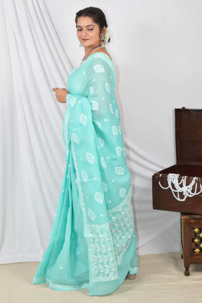 Handcrafted Sea Green Designer Cotton saree with intricate Lucknowi Chikankari embroidery and a matching blouse, ideal for festive and wedding .