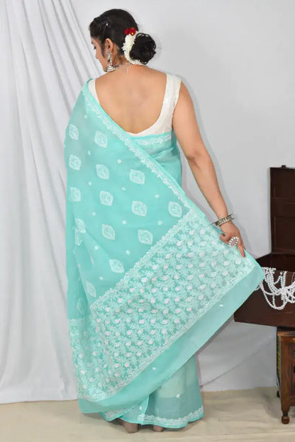 Handcrafted Sea Green Designer Cotton saree with intricate Lucknowi Chikankari embroidery and a matching blouse, ideal for festive and wedding .
