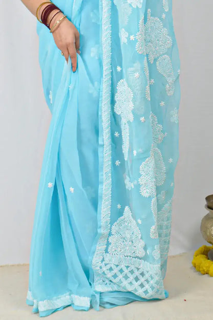 Sky blue Georgette saree with hand-embroidered Lucknowi Chikankari and matching blouse – MeMaana handcrafted ethnic wear.