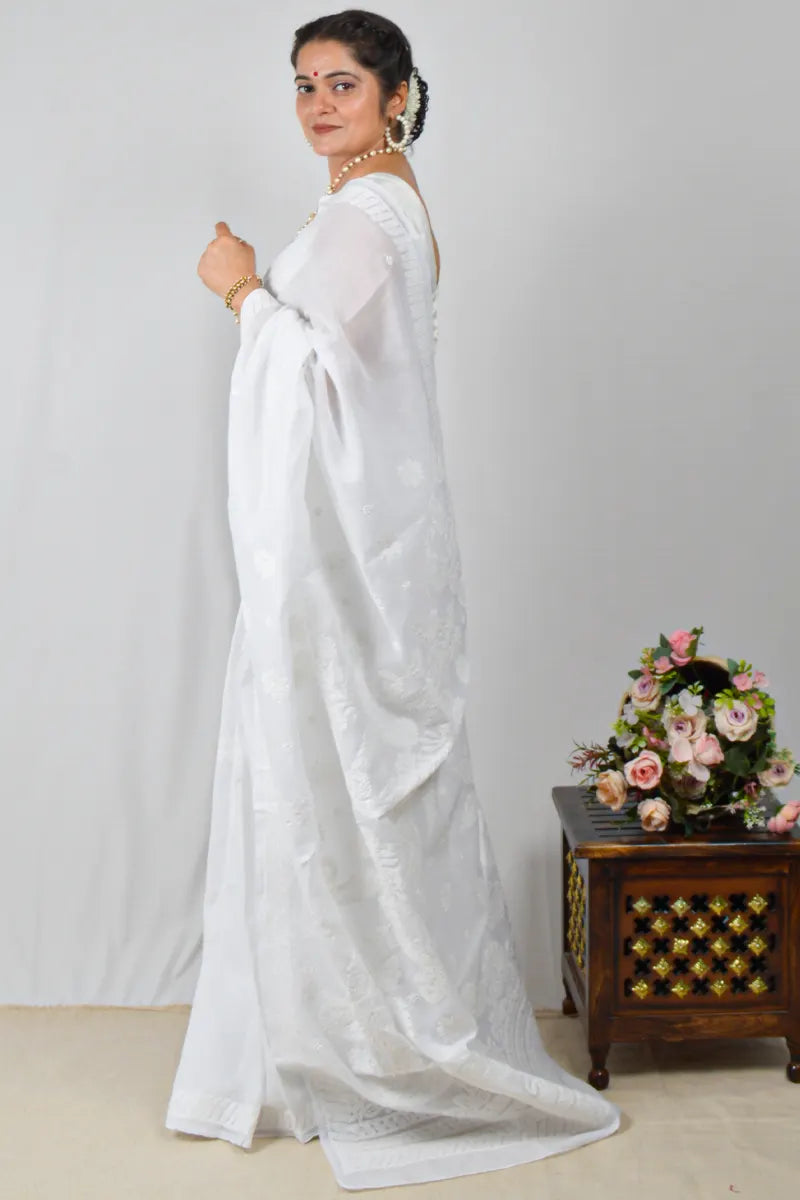 White cotton saree with hand-embroidered Lucknowi Chikankari and matching blouse – handcrafted summer-friendly ethnic wear by MeMaana.