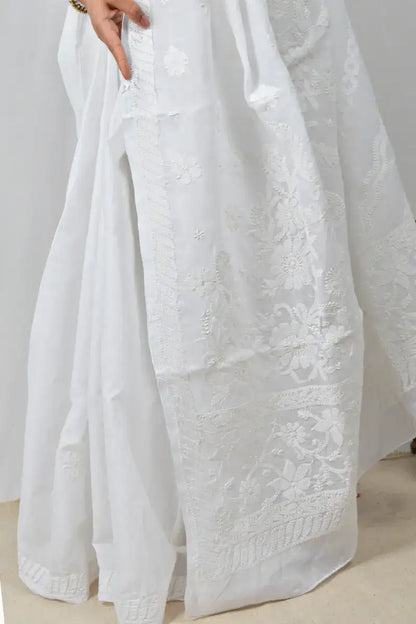 White cotton saree with hand-embroidered Lucknowi Chikankari and matching blouse – handcrafted summer-friendly ethnic wear by MeMaana.