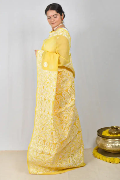 Yellow cotton saree with hand-embroidered Lucknowi Chikankari and matching blouse – handcrafted ethnic wear by MeMaana.