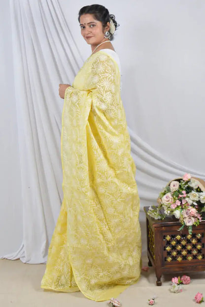 Handcrafted Yellow Allover Kota Cotton saree with intricate Lucknowi Chikankari embroidery and a matching blouse, ideal for festive and wedding .