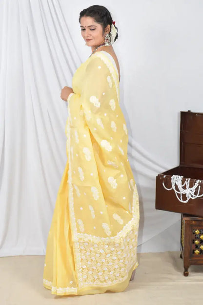 Handcrafted Yellow Designer Cotton saree with intricate Lucknowi Chikankari embroidery and a matching blouse, ideal for festive and wedding .