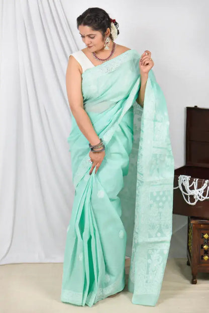 Handcrafted Green Cotton Designer Saree with intricate Lucknowi Chikankari Embroidery ,With a Matching Blouse ideal for Festive and wedding occasions
