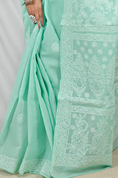 Handcrafted Green Cotton Designer Saree with intricate Lucknowi Chikankari Embroidery ,With a Matching Blouse ideal for Festive and wedding occasions