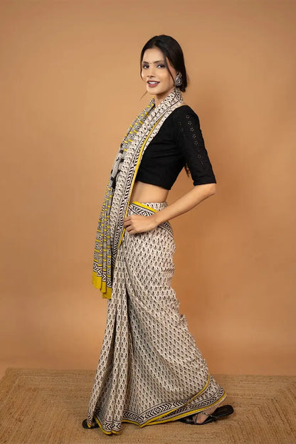 The Pranaya Edit black yellow hand block printed mulmul cotton saree